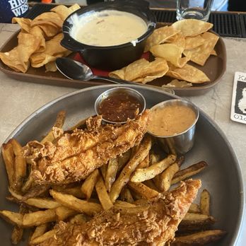 Karsen’s Grill signature dishes Salt and Pepper WingsThe Red Bird SandwichGreen Mary Lou